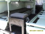 06New Medic jump seat cushion on rear step in up position.jpg