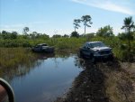 M35A2C pulls Ford & Chevy out of the mud 001.jpg
