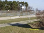 US watchtower behind reconstructed fence.jpg