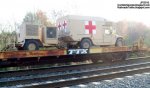 Military Medical Ambulance vehicles on CSXT Railroad train passing thru Cordele Georgia,Crisp Co.jpg
