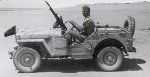 A-Vickers-K-armed-Jeep-of-G-Patrol-on-the-way-to-Barce.jpg