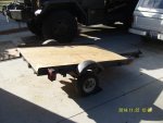 10 Fitting botton wood piece on trailer.jpg