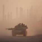 The duke in 09. Kalaeloa Airport with Campbell industrial refinery in background.jpg