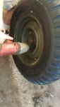 Re-tiring the un retired M38A1 - My son, on the impact gun, installs the first wheel back on the M38A1 since November of 2015.