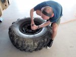 removing-spare-tire-from-rim-1.jpg