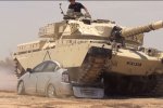 Tank-Running-Over-Prius-Roadkill.jpg