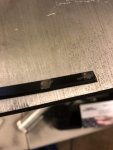 wiper arm with removed rivets front and back.jpg wiper arm with removed rivets front and back.jpg