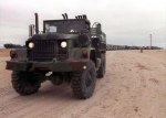 m-813-5-ton-6x6-cargo-truck-moves-toward-the-arrival-assembly-operations-element-80b930-640.jpg