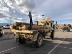 M1081_w_crane_and logs.jpg