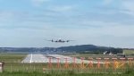 DC-6B Low pass and landing a@ Stavanger 01.jpg